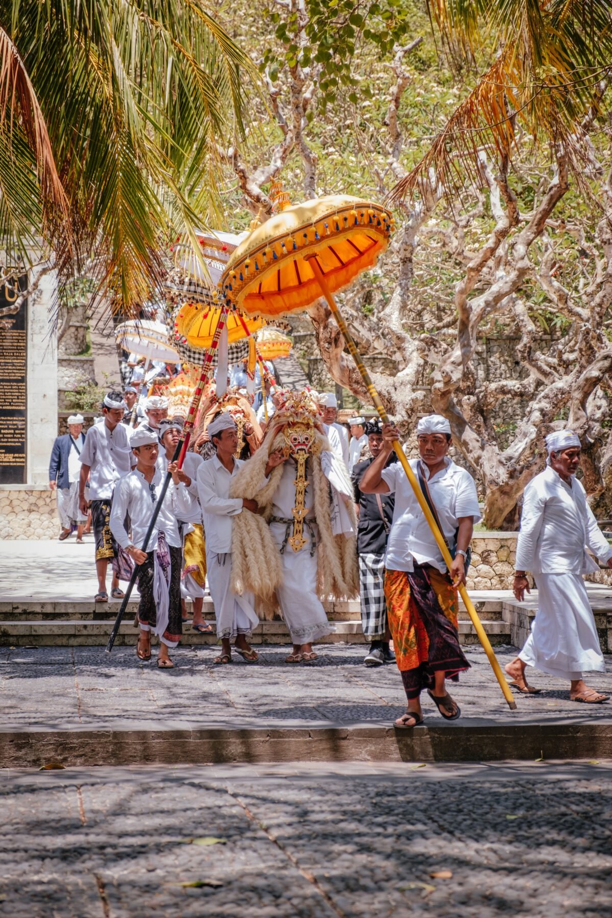 Devotees procession at Uluwatu Temple in Bali, Indonesia