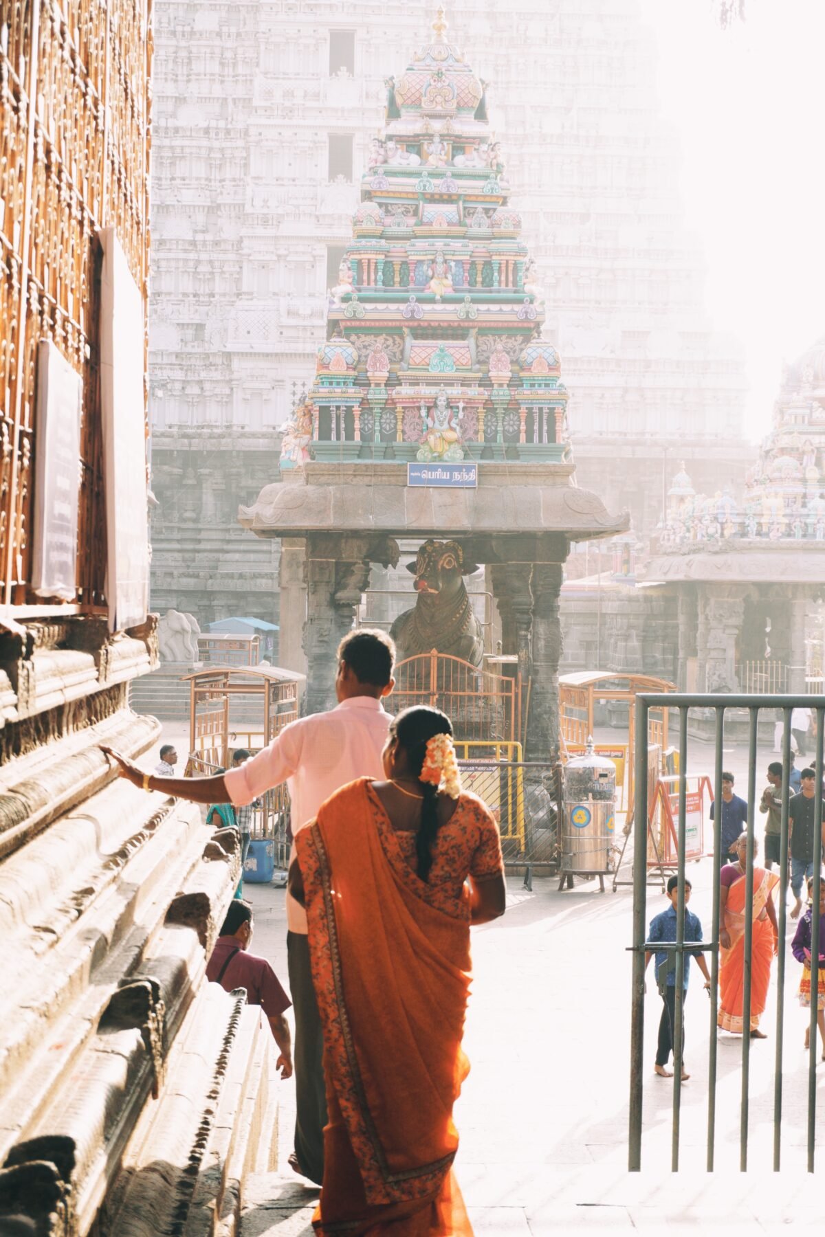 Devotees walking down the stairs at Tiruvannamalai Temple